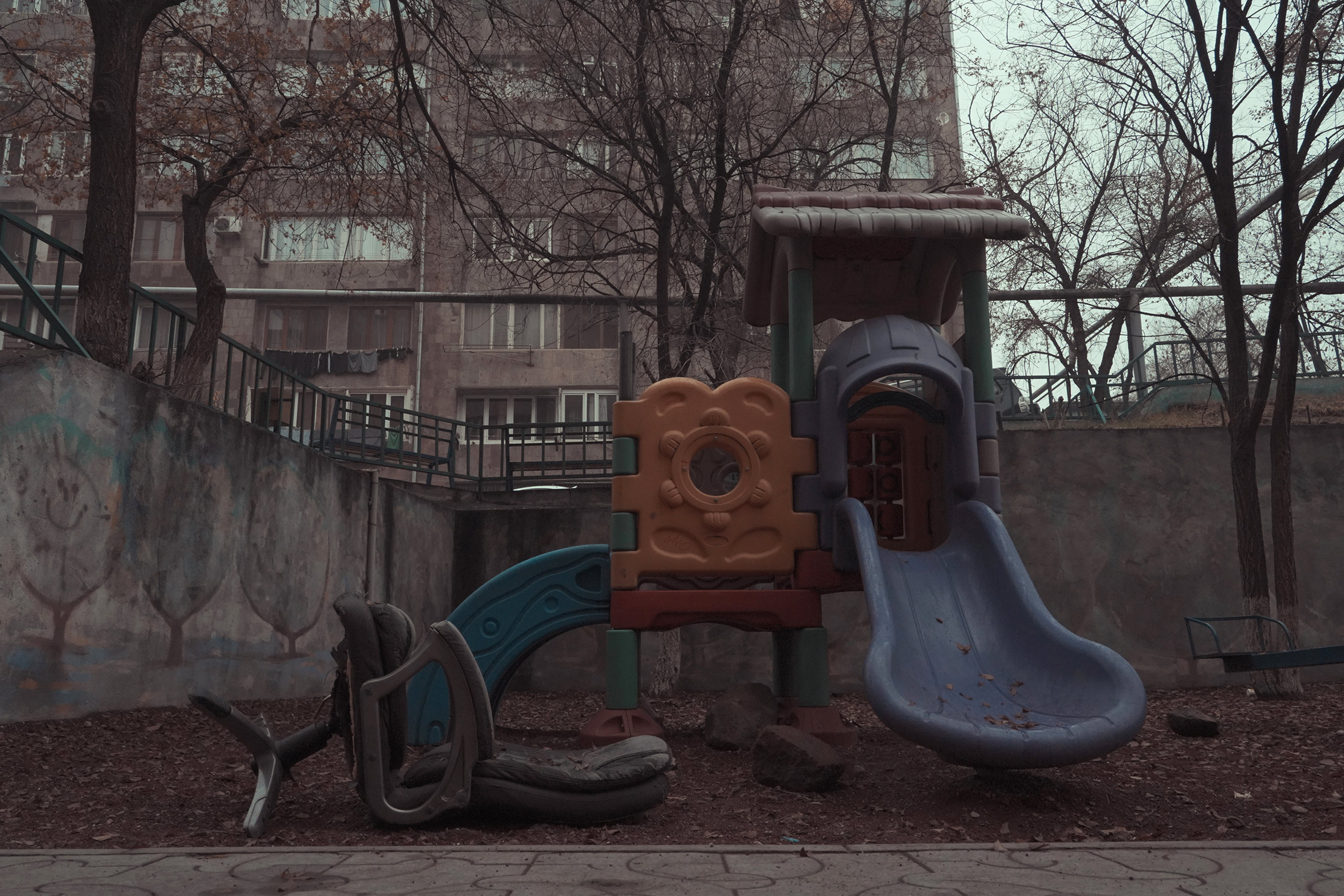 A sample of newly placed children`s playground near the typical soviet panel buildings, Aghbyur Sero ...