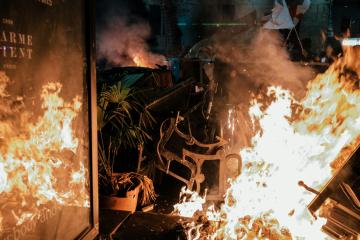 To defend themselves from water cannons, pepper spray, and the riot police, demonstrators began buil ...