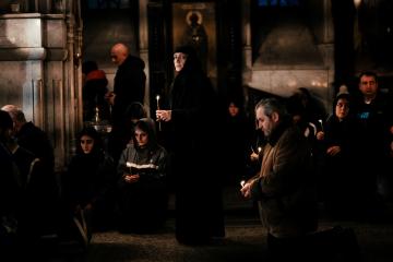 Sister Sidonia prays with protesters at the Kashueti Church on Rustaveli Avenue, where the main demo ...